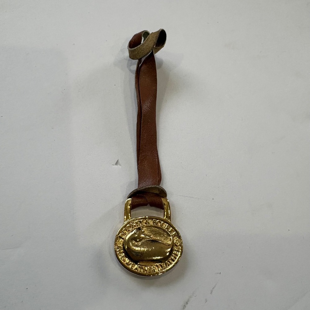 Dooney & Bourke Vintage Brass Duck Logo Bag Charm Leather Strap Gold Tone OS